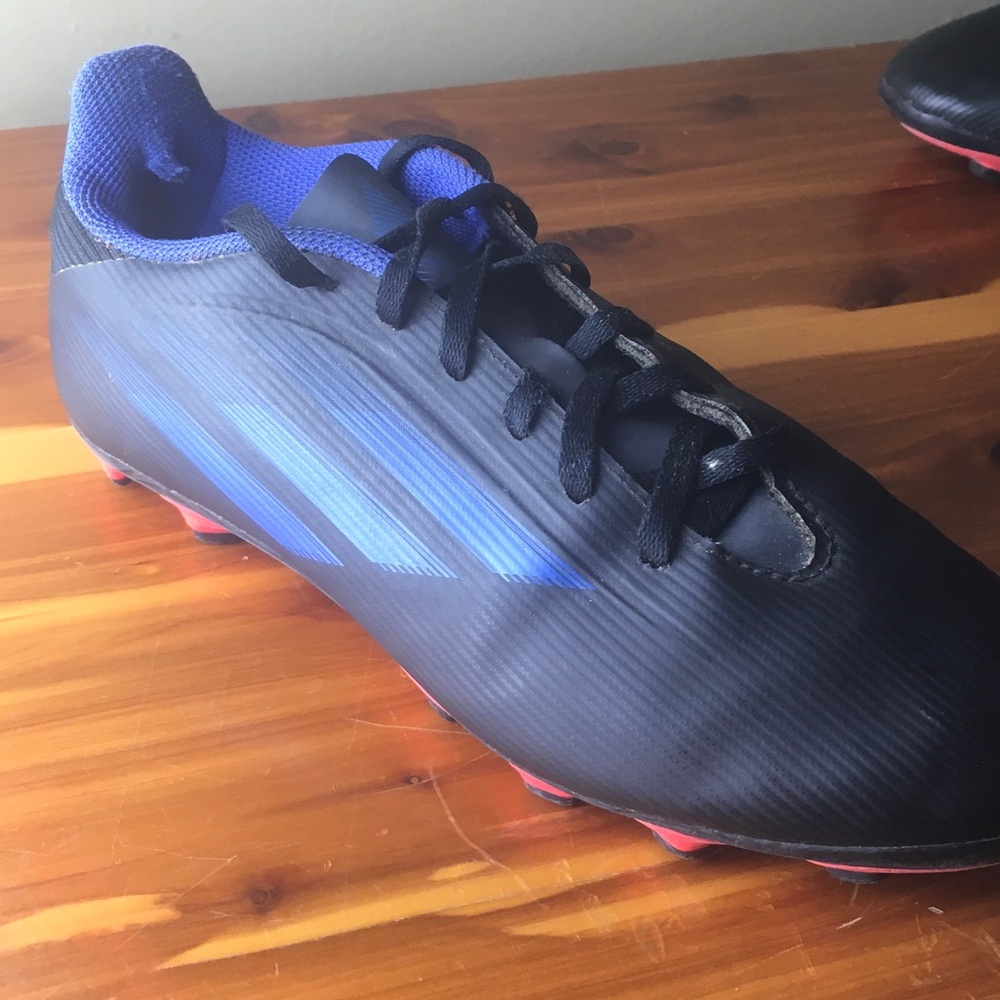 adidas Men's Black and Blue Turf Soccer Shoes with Red Outsole